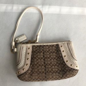 Coach logo wristlet in cream leather & tan fabric